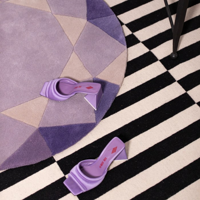 A beautiful purple pear shaped gemstone rug from Wear the House