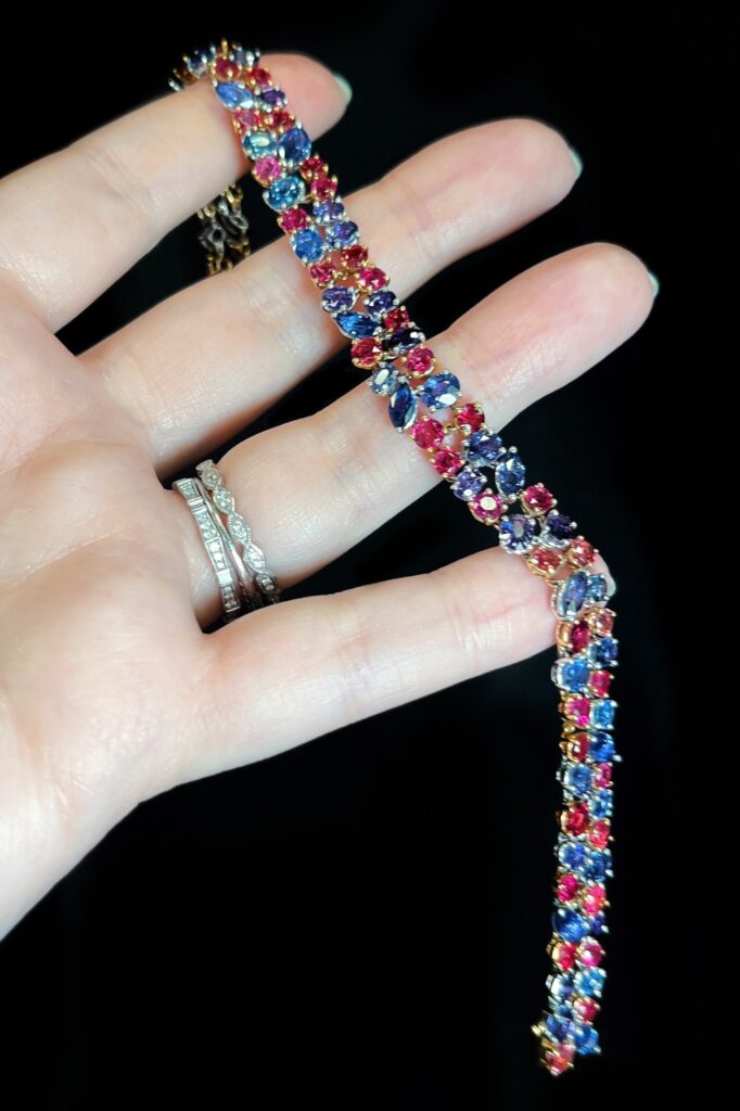 18K gold All American Treasure bracelet with 11.64 ct Yogo blue Sapphire and 5.83 ct red Beryl. By Carley Boehm, Somewhere in the Rainbow.