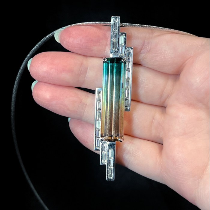 White gold pendant with a 27.15 ct tricolor Tourmaline and baguette Diamonds (2.43 ctw.) Malissa Kuznicki, A Cutting Edge Gallery.  Seen at AGTA's 2022 Spectrum Awards. 