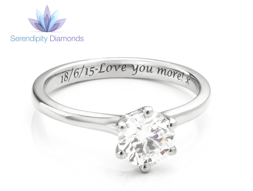Engraved solitaire ring, perfect as a promise ring with an engraving around the band. 