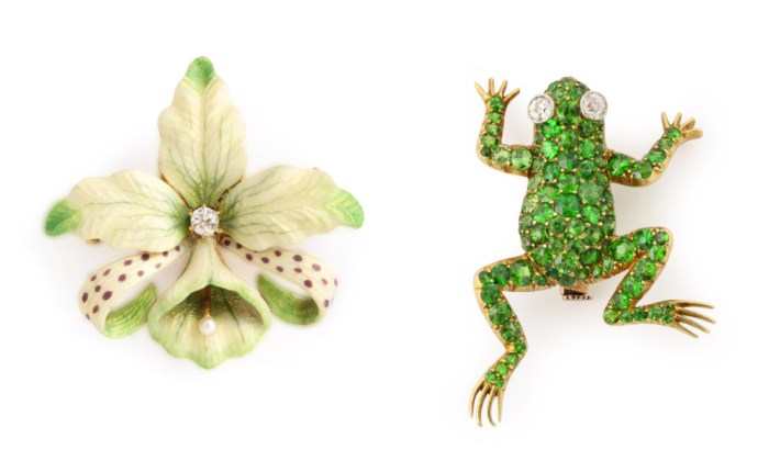 A gold and enamel orchid brooch, circa 1900, and a demantoid garnet frog brooch from A La Vieille Russie